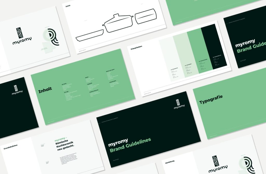 Ein Flat-Lay von mehreren Seiten eines myromy-Markenleitfadens mit grünen, schwarzen und weißen Paletten, Typografie-Mustern, Farbmustern und Designelementen in einem modernen Layout für die Event-Kampagne Tag der deutschen Einheit.